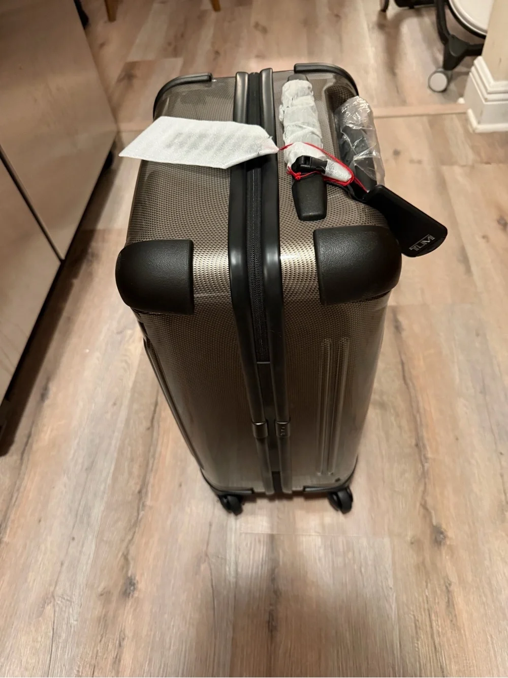 TUMI Vapor International Carry-On 22” Spinner Fossil 98408